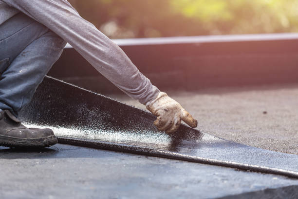 Professional Waterproofing technician working in Hewlett, NY